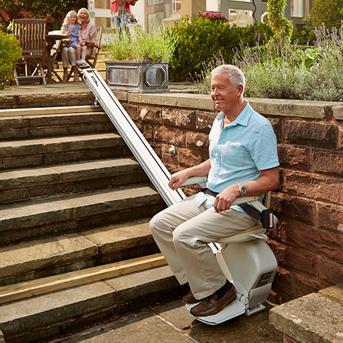 Man on outdoor stairlift