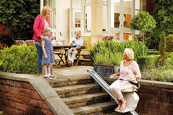 Woman on outdoor stairlift